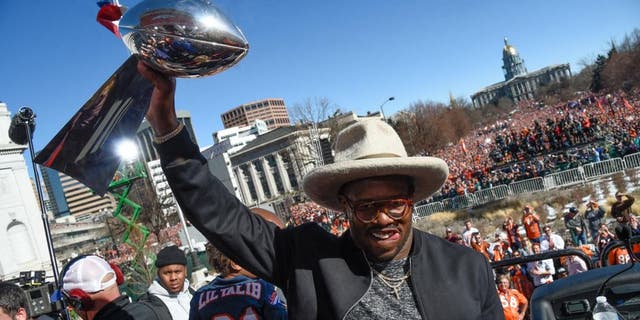 DENVER, CO - FEBRUARY 09: Denver Broncos Von Miller smiles as he holds up the Super Bowl trophy on the stage during the celebration. Von Miller was named MVP of Super Bowl 50 after their 24-10 victory over the Carolina Panthers. The Denver Broncos celebrated their Super Bowl victory with a a parade and celebration February 9, 2016 at the City & County Building. (Photo By John Leyba/The Denver Post via Getty Images)
