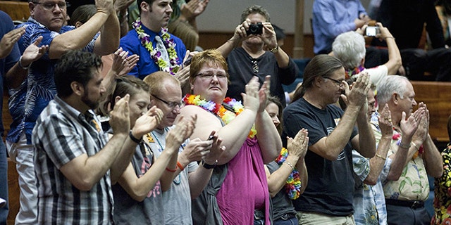 Feb. 16: Supports of the Hawaii Civil Unions Bill applaud, celebrating the Hawaii Senate's vote 18-5 to approve the Civil Unions bill at the State Capitol in Honolulu, Hawaii.