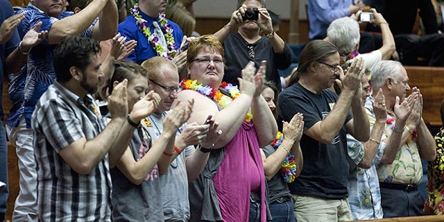 Feb. 16: Supports of the Hawaii Civil Unions Bill applaud, celebrating the Hawaii Senate's vote 18-5 to approve the Civil Unions bill at the State Capitol in Honolulu, Hawaii.