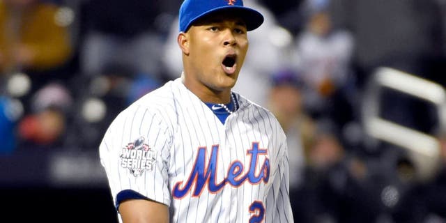 Oct 30, 2015; New York City, NY, USA; New York Mets relief pitcher Jeurys Familia (27) reacts after defeating the Kansas City Royals in game three of the World Series at Citi Field. Mandatory Credit: Robert Deutsch-USA TODAY Sports