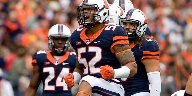 Sep 12, 2015; Champaign, IL, USA; Illinois Fighting Illini linebacker T.J. Neal (52) celebrates a sack against the Western Illinois Leathernecks at Memorial Stadium. Mandatory Credit: Mike Granse-USA TODAY Sports