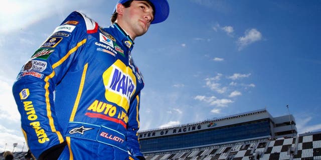 DAYTONA BEACH, FL - FEBRUARY 14: Chase Elliott, driver of the #24 NAPA Auto Parts Chevrolet, walks on the grid during qualifying for the NASCAR Sprint Cup Series Daytona 500 at Daytona International Speedway on February 14, 2016 in Daytona Beach, Florida. (Photo by Jonathan Ferrey/NASCAR via Getty Images)