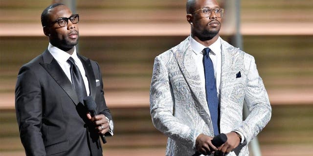 LOS ANGELES, CA - FEBRUARY 15: NFL players Anquan Boldin (L) and Von Miller onstage during The 58th GRAMMY Awards at Staples Center on February 15, 2016 in Los Angeles, California. (Photo by Kevork Djansezian/Getty Images for NARAS)
