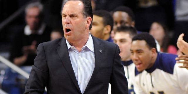 Notre Dame coach Mike Brey reacts to his team's play in the second half of an NCAA college basketball game against Wake Forest Tuesday, Feb. 17, 2015, in South Bend, Ind. Notre Dame won 88-75 pushing their record to 23-4. (AP Photo/Joe Raymond)