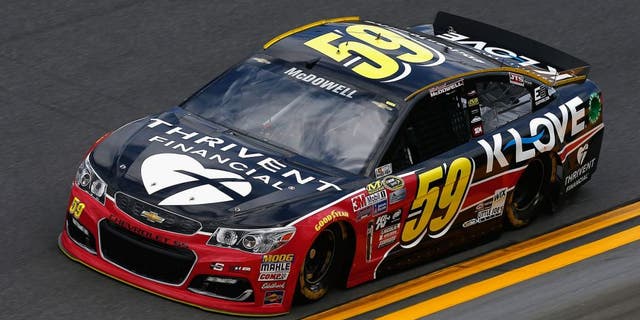 DAYTONA BEACH, FL - FEBRUARY 14: Michael McDowell, driver of the #59 Thrivent Financial Chevrolet, drives during qualifying for the NASCAR Sprint Cup Series Daytona 500 at Daytona International Speedway on February 14, 2016 in Daytona Beach, Florida. (Photo by Jeff Zelevansky/Getty Images)