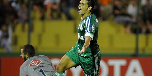 Brazil's Palmeiras player Jaen celebrates after scoring against Uruguay's River Plate during their Copa Libertadores football match in Maldonado, Uruguay, on February 16, 2016. AFP PHOTO / DANTE FERNANDEZ / AFP / DANTE FERNANDEZ (Photo credit should read DANTE FERNANDEZ/AFP/Getty Images)