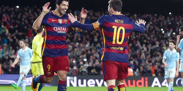 BARCELONA, SPAIN - FEBRUARY 14: (L-R) Luis Suarez of FC Barcelona celebrates with his team mate Lionel Messi of FC Barcelona after scoring his team's fourth goal from the penalty spot during the La Liga match between FC Barcelona and Celta Vigo at Camp Nou on February 14, 2016 in Barcelona, Spain. (Photo by David Ramos/Getty Images)