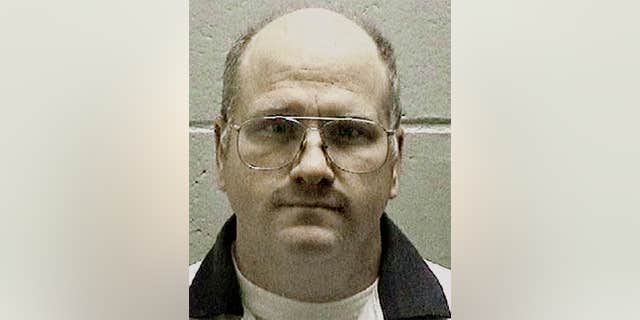 FILE -In this undated file photo released by the Georgia Department of Corrections shows death row inmate and former U.S. Navy sailor Travis Hittson in Georgia. Hittson, 45, is to scheduled be put to death Wednesday evening, Feb. 17, 2016.