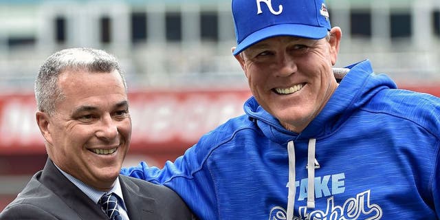 Kansas City Royals general manager Dayton Moore and manager Ned Yost are introduced during Tuesday's Kansas City Royals rally and public workout on October 6, 2015 at Kauffman Stadium in Kansas City, Mo. (John Sleezer/Kansas City Star/TNS via Getty Images)