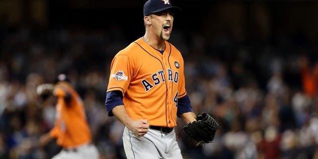 Oct 6, 2015; Bronx, NY, USA; Houston Astros relief pitcher Luke Gregerson (44) reacts after closing out the ninth inning against the New York Yankees in the American League Wild Card playoff baseball game at Yankee Stadium. Houston won 3-0. Mandatory Credit: Adam Hunger-USA TODAY Sports