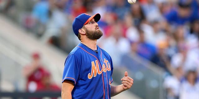 NEW YORK, NY - JULY 24: Jonathon Niese #49 of the New York Mets reacts after giving up a solo home run to Justin Turner of the Los Angeles Dodgers in the third inning on July 24, 2015 at Citi Field in the Flushing neighborhood of the Queens borough of New York City. (Photo by Elsa/Getty Images)