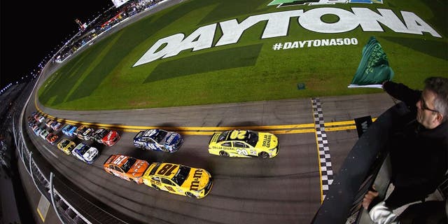 DAYTONA BEACH, FL - FEBRUARY 18: Matt Kenseth, driver of the #20 Dollar General Toyota, leads the field to the green flag to start the NASCAR Sprint Cup Series Can-Am Duels at Daytona International Speedway on February 18, 2016 in Daytona Beach, Florida. (Photo by Sarah Crabill/NASCAR via Getty Images)