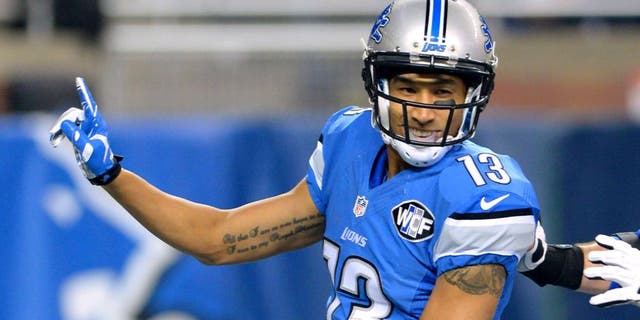 DETROIT, MI - DECEMBER 27: TJ Jones #13 of the Detroit Lions reacts after scoring his first NFL touchdown during the game against the San Francisco 49ers at Ford Field on December 27, 2015 in Detroit, Michigan. The Lions defeated the 49ers 32-17. (Photo by Mark Cunningham/Detroit Lions/Getty Images)