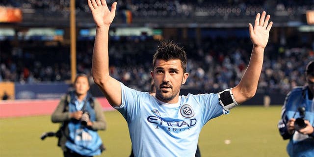 Oct 25, 2015; New York, NY, USA; New York City FC forward David Villa (7) waves after the MLS game against the New England Revolution at Yankee Stadium. The Revolution won, 3-1. Mandatory Credit: Vincent Carchietta-USA TODAY Sports