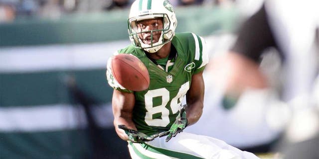 Sep 22, 2013; East Rutherford, NJ, USA; New York Jets wide receiver Stephen Hill (84) catches a pass against the Buffalo Bills at MetLife Stadium. Mandatory Credit: Robert Deutsch-USA TODAY Sports