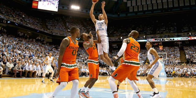 CHAPEL HILL, NC - FEBRUARY 20: Brice Johnson #11 of the North Carolina Tar Heels shoots over Kamari Murphy #21 of the Miami Hurricanes during their game at Dean Smith Center on February 20, 2016 in Chapel Hill, North Carolina. (Photo by Streeter Lecka/Getty Images)