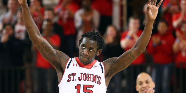 Feb 21, 2015; Jamaica, NY, USA; St. John's Red Storm guard Sir'Dominic Pointer (15) and guard D'Angelo Harrison (11) react during the second half against the Seton Hall Pirates at Carnesecca Arena. Mandatory Credit: Brad Penner-USA TODAY Sports