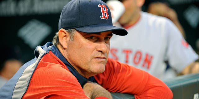 Sep 19, 2014; Baltimore, MD, USA; Boston Red Sox manager John Farrell (53) looks on during the game against the Baltimore Orioles at Oriole Park at Camden Yards. Mandatory Credit: Joy R. Absalon-USA TODAY Sports