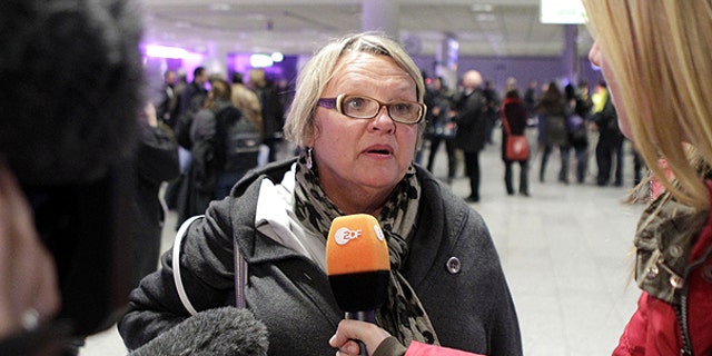 Feb. 22: Didi Blackburn from Dallas, Texas, talks to the media at the airport in Frankfurt, central Germany, after she was flown out of Tripoli, Libya.