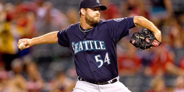 ANAHEIM, CA - SEPTEMBER 16: Tom Wilhelmsen #54 of the Seattle Mariners pitches during the game against the Los Angeles Angels of Anaheim on September 16, 2014 at Angel Stadium of Anaheim in Anaheim, California. (Photo by Matt Brown/Angels Baseball LP/Getty Images)
