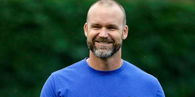 CHICAGO, IL - JUNE 11: David Ross #3 of the Chicago Cubs smiles during batting practice before the game against the Cincinnati Reds at Wrigley Field on June 11, 2015 in Chicago, Illinois. (Photo by Jon Durr/Getty Images)