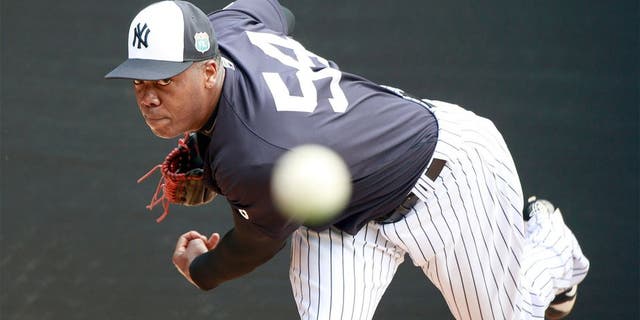 Feb 23, 2016; Tampa, FL, USA; New York Yankees relief pitcher Aroldis Chapman (54) pitches in the bullpen at George M. Steinbrenner Field. Mandatory Credit: Kim Klement-USA TODAY Sports
