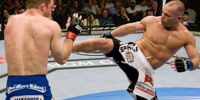 LAS VEGAS - MAY 23: Matt Hughes (blue shorts) def. Matt Serra (white shorts) - Unanimous Decision during UFC 98 at MGM Grand Arena on May 23, 2009 in Las Vegas, Nevada. (Photo by Josh Hedges/Zuffa LLC via Getty Images)