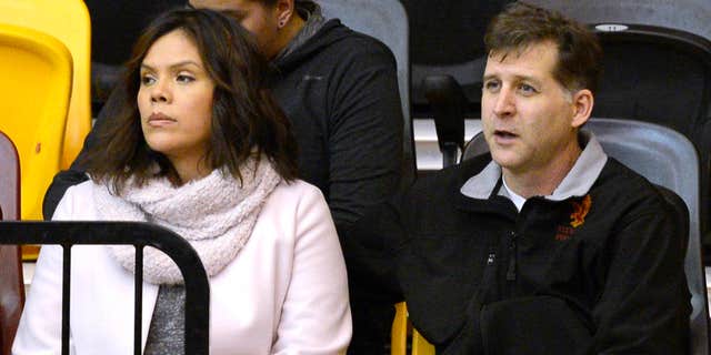 From left, Santa Fe Indian School’s former head boys basketball coach Ceci Moses and her husband, Rick Schimmel, attend the school’s boys basketball game Tuesday, Feb. 23, 2016 in the Pueblo Pavilion at Santa Fe Indian School in Santa Fe, New Mexico.