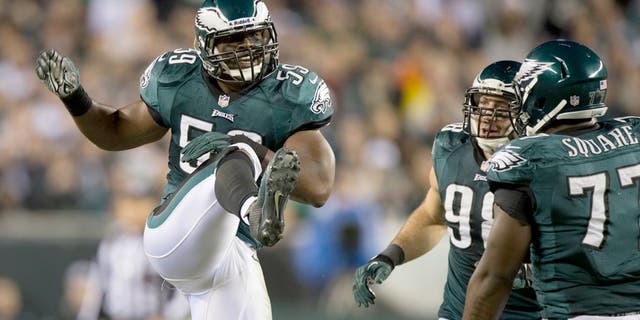 Dec 22, 2013; Philadelphia, PA, USA;Philadelphia Eagles inside linebacker DeMeco Ryans (59) celebrates after breaking up a pass during the third quarter at Lincoln Financial Field. Mandatory Credit: Tommy Gilligan-USA TODAY Sports