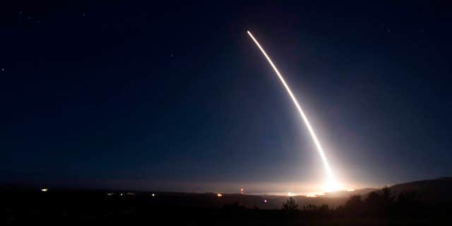 FILE - In this Saturday, Feb. 20, 2016 file photo provided by U.S. Air Force, an unarmed Minuteman III intercontinental ballistic missile launches during an operational test at Vandenberg Air Force Base, Calif.