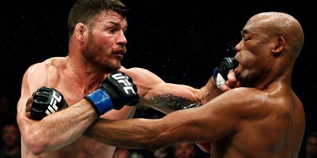 LONDON, ENGLAND - FEBRUARY 27: Anderson 'The Spider' Silva of Brazil (R) and Michael 'The Count' Bisping of England (L) compete in their Middleweight bout during the UFC Fight Night held at at Indigo at The O2 Arena on February 27, 2016 in London, England. (Photo by Dean Mouhtaropoulos/Zuffa LLC/Zuffa LLC via Getty Images)