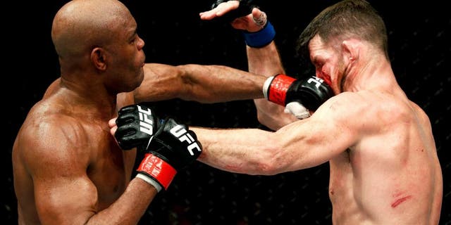 LONDON, ENGLAND - FEBRUARY 27: Anderson 'The Spider' Silva of Brazil (L) and Michael 'The Count' Bisping of England (R) compete in their Middleweight bout during the UFC Fight Night held at at Indigo at The O2 Arena on February 27, 2016 in London, England. (Photo by Dean Mouhtaropoulos/Zuffa LLC/Zuffa LLC via Getty Images)