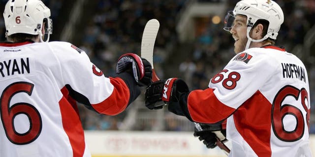 SAN JOSE, CA - FEBRUARY 28: Mike Hoffman #68 is congratulated by Bobby Ryan #6 of the Ottawa Senators after he scored a goal in the third period against the San Jose Sharks at SAP Center on February 28, 2015 in San Jose, California. (Photo by Ezra Shaw/Getty Images)