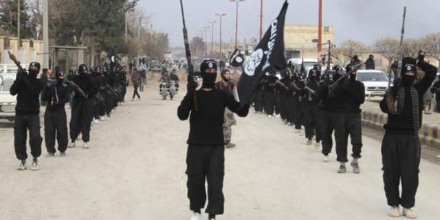 Fighters of the Islamic State recently burned to death five women and their sons, according to reports from Iraq. (Reuters)