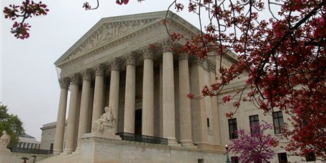 FILE: The United States Supreme Court is seen in Washington, ahead of the landmark hearings on the federal health care overhaul.