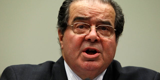 Supreme Court Justice Antonin Scalia testifies before a House Judiciary Commercial and Administrative Law Subcommittee on Capitol Hill in Washington May 20, 2010.<br>