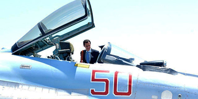 Syria's President Bashar al-Assad visits a Russian air base at Hmeymim, in western Syria in this handout picture posted on SANA on June 27, 2017, Syria. SANA/Handout via REUTERS ATTENTION EDITORS - THIS PICTURE WAS PROVIDED BY A THIRD PARTY. REUTERS IS UNABLE TO INDEPENDENTLY VERIFY THE AUTHENTICITY, CONTENT, LOCATION OR DATE OF THIS IMAGE - RTS18TY7