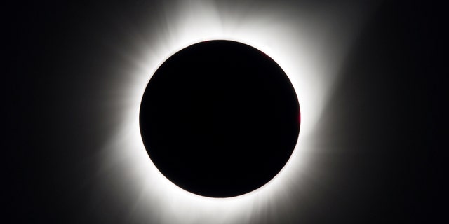 A total solar eclipse is seen above Madras, Oregon, U.S., August 21, 2017. Courtesy Aubrey Gemignani/NASA/Handout via REUTERS ATTENTION EDITORS - THIS IMAGE HAS BEEN SUPPLIED BY A THIRD PARTY. MANDATORY CREDIT TPX IMAGES OF THE DAY - RTS1CP3P