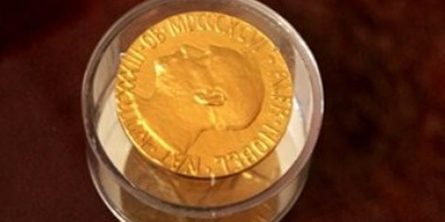 This Thursday, Dec. 16, 2010 photo shows Jane Addams' Nobel Peace Prize at the Hull House Museum in Chicago.