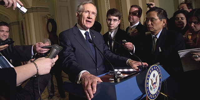 March 1: Senate Majority Leader Sen. Harry Reid, D- Nev., talks to the media after a Democratic policy luncheon in Washington.