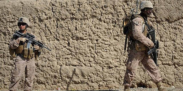 Feb. 23: Soldiers from the U.S. Marines 2nd Batallion, 1st Marines Regiment patrol in Garmser, Helmand province, Southern Afghanistan.