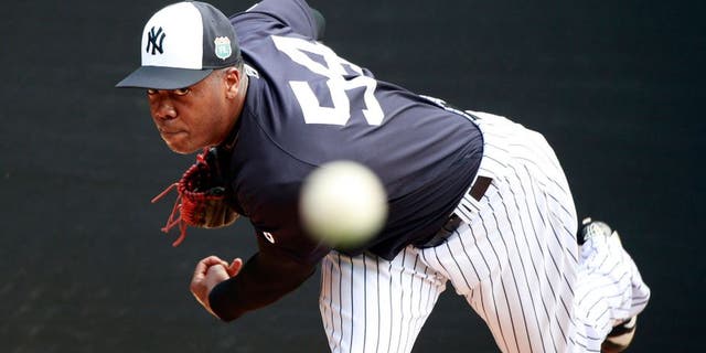 Feb 29, 2016; Tampa, FL, USA; New York Yankees relief pitcher Aroldis Chapman (54) pitches in live batting practice at George M. Steinbrenner Stadium. Mandatory Credit: Butch Dill-USA TODAY Sports