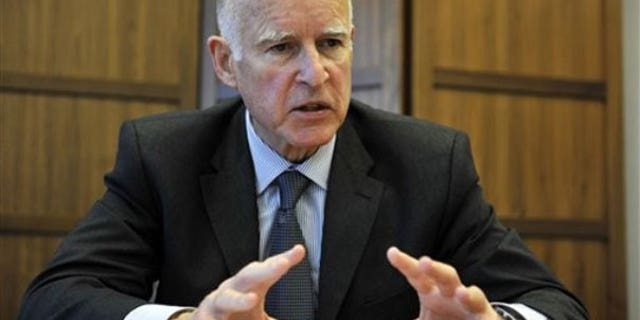 In this photo taken Dec. 24, 2009, Jerry Brown reflects on his tenure as Attorney General in his office in Oakland, Calif. (AP).