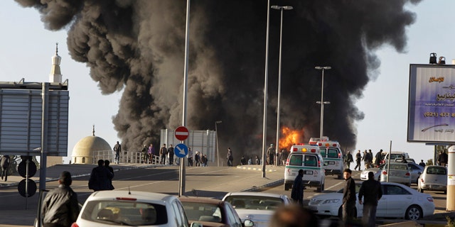 March 2: Emergency services attend to the scene of a fuel-tanker explosion, which security forces at the scene said was due to a road accident, in Tripoli, Libya.