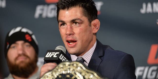 BOSTON, MA - JANUARY 17: Dominick Cruz speaks to the media at the post fight press conference after defeating TJ Dillashaw in their UFC bantamweight championship bout during the UFC Fight Night event inside TD Garden on January 17, 2016 in Boston, Massachusetts. (Photo by Brandon Magnus/Zuffa LLC/Zuffa LLC via Getty Images)