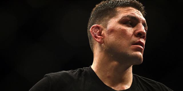 LAS VEGAS, NV - JANUARY 31: Nick Diaz stands in the Octagon after his middleweight bout during the UFC 183 event at the MGM Grand Garden Arena on January 31, 2015 in Las Vegas, Nevada. (Photo by Jeff Bottari/Zuffa LLC/Zuffa LLC via Getty Images)