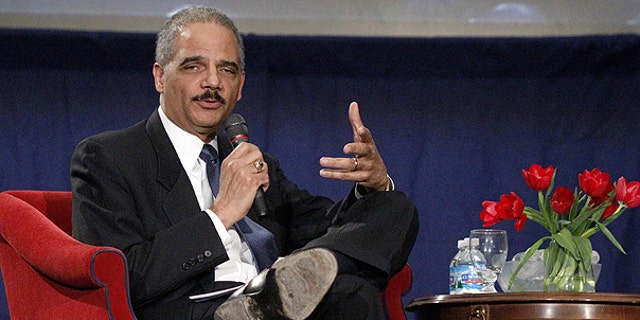 Feb. 23: Attorney General Eric Holder answers a student's question after his speech commemorating the 100th anniversary of the Duquesne University School of Law in Pittsburgh.