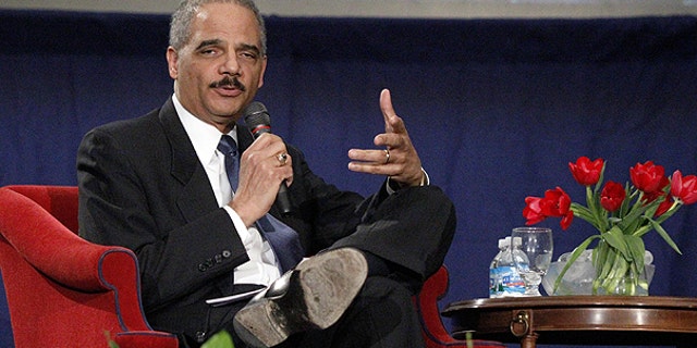 Feb. 23: Attorney General Eric Holder answers a student's question after his speech commemorating the 100th anniversary of the Duquesne University School of Law in Pittsburgh.
