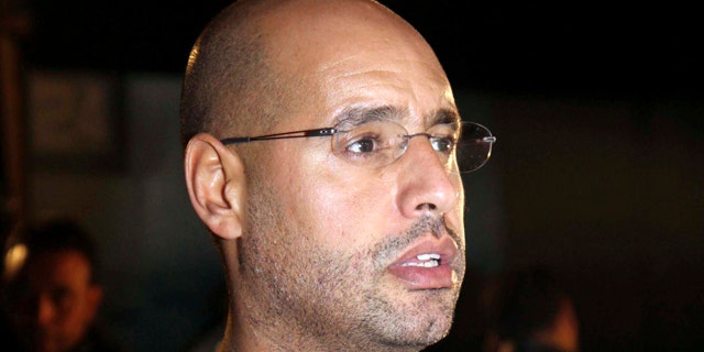 Feb. 22: Saif al-Islam Qaddafi, son of Libyan leader Muammar al-Qaddafi, waits before a press conference in Tripoli, Libya.