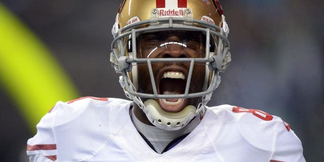 Jan 19, 2014; Seattle, WA, USA; San Francisco 49ers wide receiver Anquan Boldin (81) celebrates after catching a touchdown pass against the Seattle Seahawks in the third quarter of the 2013 NFC Championship football game at CenturyLink Field. Mandatory Credit: Kirby Lee-USA TODAY Sports